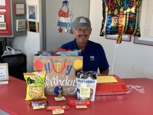 troy, manager of ustor wichita celebrates his birthday, and 40 years at ustor